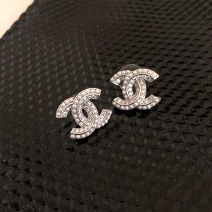 Silver “Chanel” Logo Earrings